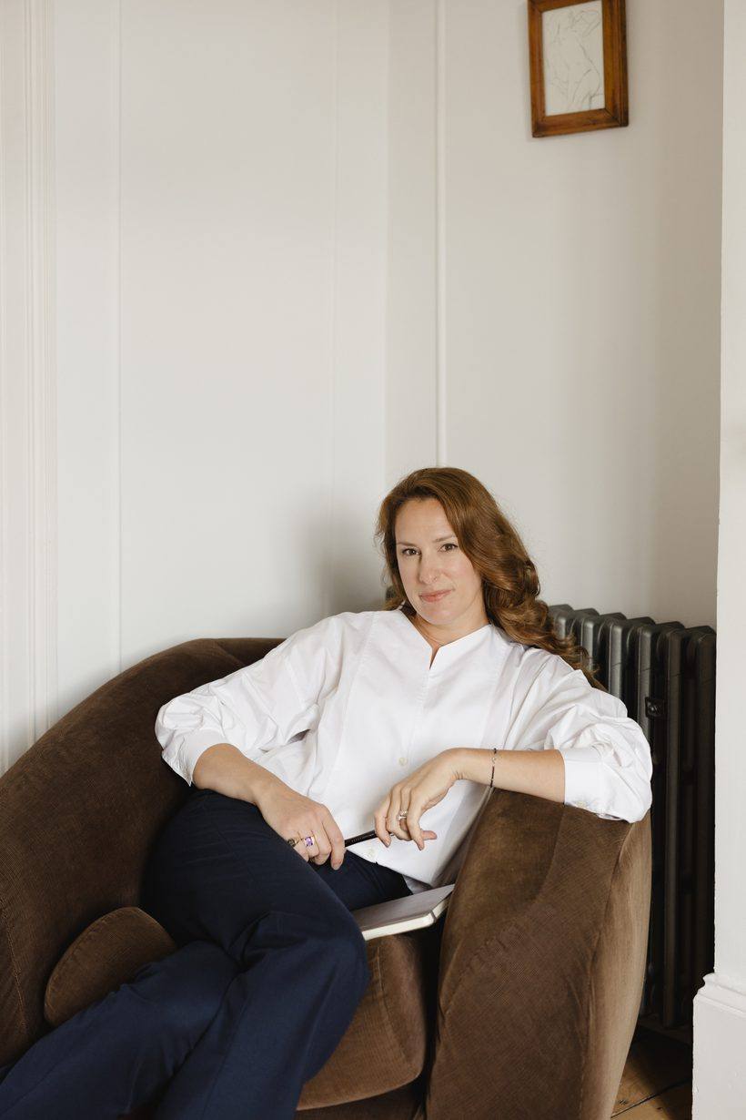 Anastasia Roumelioti seated in an armchair